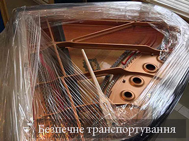 Перевезти піаніно по Києву послуги вантажників